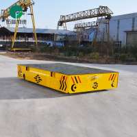 Trackless Material Handling Electric Transfer Trailer On Cement Floor